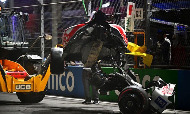 JEDDAH, SAUDI ARABIA - MARCH 26: The car of Mick Schumacher of Germany and Haas F1 is removed from the track following a crash during qualifying ahead of the F1 Grand Prix of Saudi Arabia at the Jeddah Corniche Circuit on March 26, 2022 in Jeddah, Saudi Arabia. (Photo by Clive Mason/Getty Images)